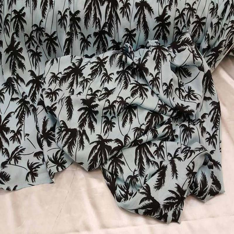 100% Rayon Challis Black Palm Trees On Baby Blue Background Soft And Flowy FabricChallis FabricICEFABRICICE FABRICS100% Rayon Challis Black Palm Trees On Baby Blue Background Soft And Flowy Fabric ICEFABRIC