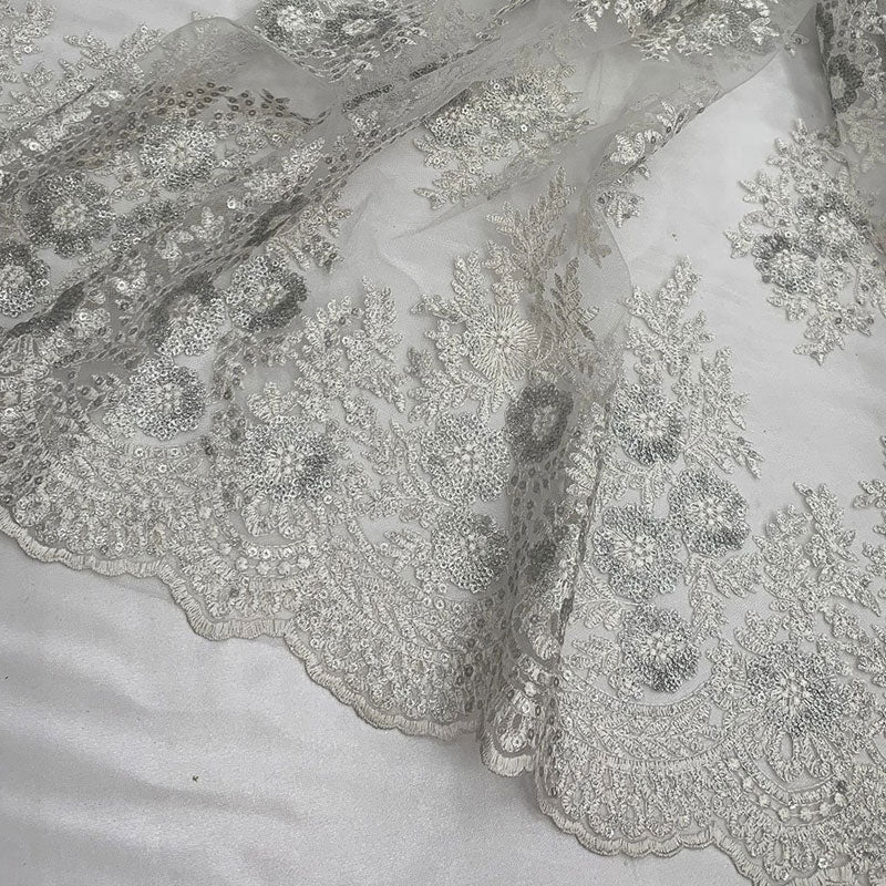 Embroidered Corded Metallic Flowers On Mesh Lace Fabric With SequinsICEFABRICICE FABRICSWhite/SilverEmbroidered Corded Metallic Flowers On Mesh Lace Fabric With Sequins ICEFABRIC White/Silver