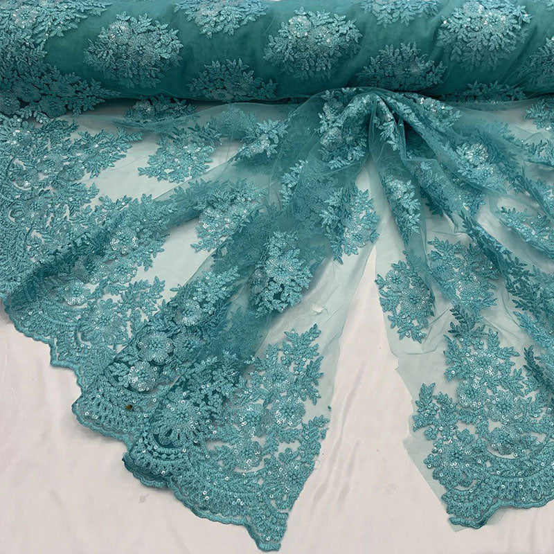 Embroidered Corded Metallic Flowers On Mesh Lace Fabric With SequinsICEFABRICICE FABRICSAquaEmbroidered Corded Metallic Flowers On Mesh Lace Fabric With Sequins ICEFABRIC Aqua