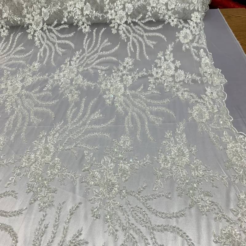 Handmade Embroidery Off-White Lace Fabric / Beaded lace on MeshICE FABRICSICE FABRICSBy The YardHandmade Embroidery Off-White Lace Fabric / Beaded lace on Mesh ICE FABRICS