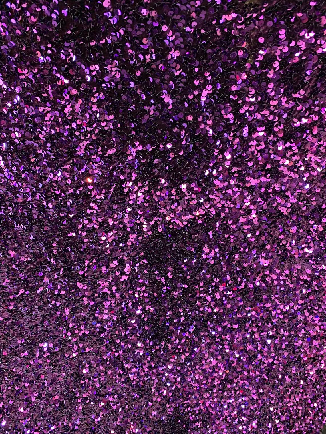 Iridescent Purple Mermaid Sequin on Purple Stretch Velvet Spandex FabricICE FABRICSICE FABRICSPer YardIridescent Purple Mermaid Sequin on Purple Stretch Velvet Spandex Fabric ICE FABRICS