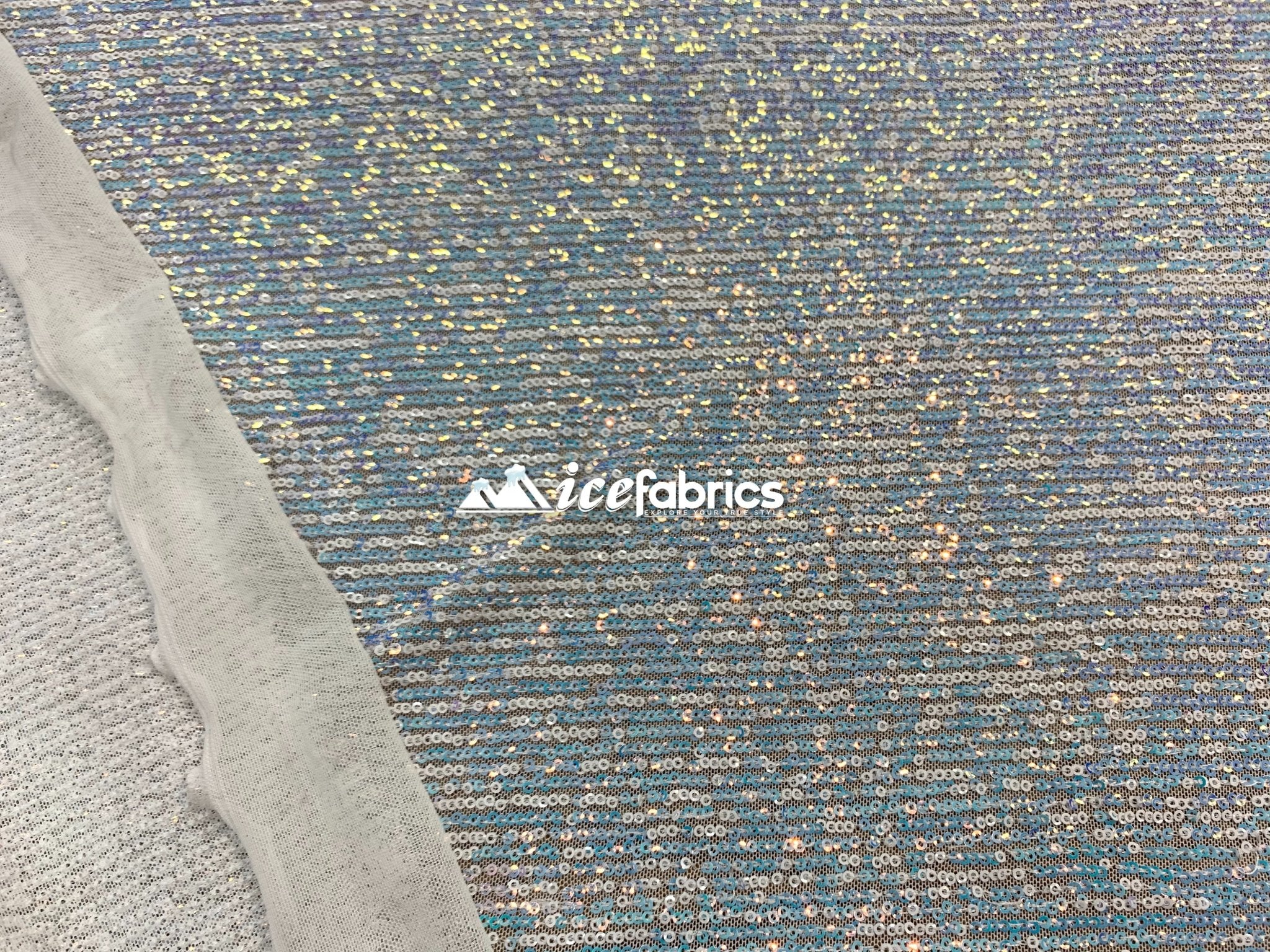 Iridescent Sequin 2 Way Mesh Stretch Sequins Fabric By The YardICEFABRICICE FABRICSWhite Blue IridescentIridescent Sequin 2 Way Mesh Stretch Sequins Fabric By The Yard ICEFABRIC White Blue Iridescent
