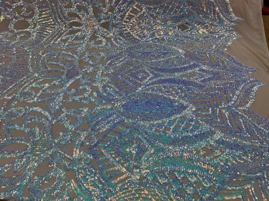 London Design 4 WAY Stretch Sequins Fabric SpandexICEFABRICICE FABRICSSky Blue on Nude MeshLondon Design 4 WAY Stretch Sequins Fabric Spandex ICEFABRIC Sky Blue on Nude Mesh