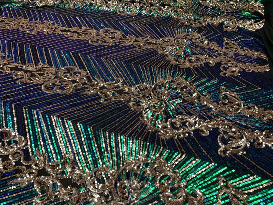 Nadia 4 Way Stretch Sequin Spandex Embroidered Fabric Sold By The YardICE FABRICSICE FABRICSIridescent Green Gold On Black Mesh1 YardNadia 4 Way Stretch Sequin Spandex Embroidered Fabric Sold By The Yard ICE FABRICS