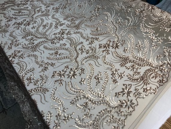 New Champagne Designed Embroidery Stretch Sequin 4 Way On A Mesh Lace Fabric Sold By The YardICE FABRICSICE FABRICSNew Champagne Designed Embroidery Stretch Sequin 4 Way On A Mesh Lace Fabric Sold By The Yard ICE FABRICS