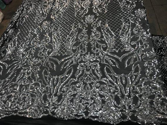 New Design 4 Way Stretch Sequins On A Mesh Lace Fabric For Decorations Fashion Wedding Prom DressesICE FABRICSICE FABRICSBlack/SilverNew Design 4 Way Stretch Sequins On A Mesh Lace Fabric For Decorations Fashion Wedding Prom Dresses ICE FABRICS