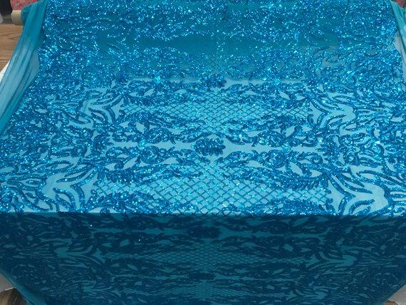 New Design 4 Way Stretch Sequins On A Mesh Lace Fabric For Decorations Fashion Wedding Prom DressesICE FABRICSICE FABRICSTurquoiseNew Design 4 Way Stretch Sequins On A Mesh Lace Fabric For Decorations Fashion Wedding Prom Dresses ICE FABRICS