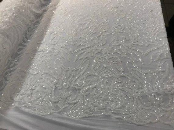 New Design 4 Way Stretch Sequins On A Mesh Lace Fabric For Decorations Fashion Wedding Prom DressesICE FABRICSICE FABRICSWhiteNew Design 4 Way Stretch Sequins On A Mesh Lace Fabric For Decorations Fashion Wedding Prom Dresses ICE FABRICS