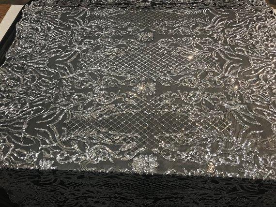 New Design 4 Way Stretch Sequins On A Mesh Lace Fabric For Decorations Fashion Wedding Prom DressesICE FABRICSICE FABRICSBlack/SilverNew Design 4 Way Stretch Sequins On A Mesh Lace Fabric For Decorations Fashion Wedding Prom Dresses ICE FABRICS