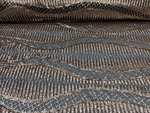 Snake Design Bronze Spandex 4 Way Geometric Embroidered Stretch Sequin On A Black Mesh Lace FabricICEFABRICICE FABRICSBlack1/2Snake Design Bronze Spandex 4 Way Geometric Embroidered Stretch Sequin On A Black Mesh Lace Fabric ICEFABRIC