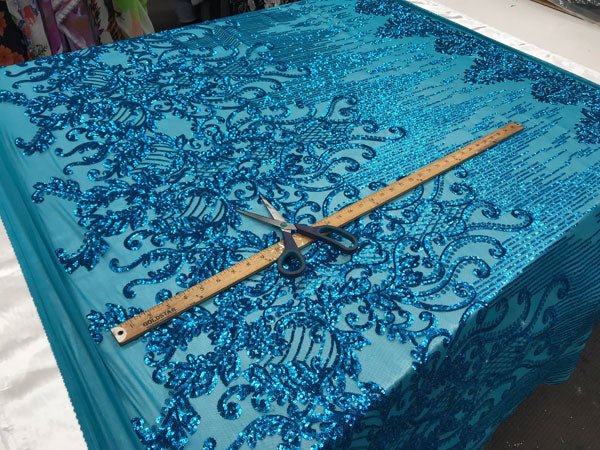 Turquoise Luxury Design Embroidered 4 Way Stretch Sequin Fabric Sold By The YardICE FABRICSICE FABRICSTurquoise Luxury Design Embroidered 4 Way Stretch Sequin Fabric Sold By The Yard ICE FABRICS
