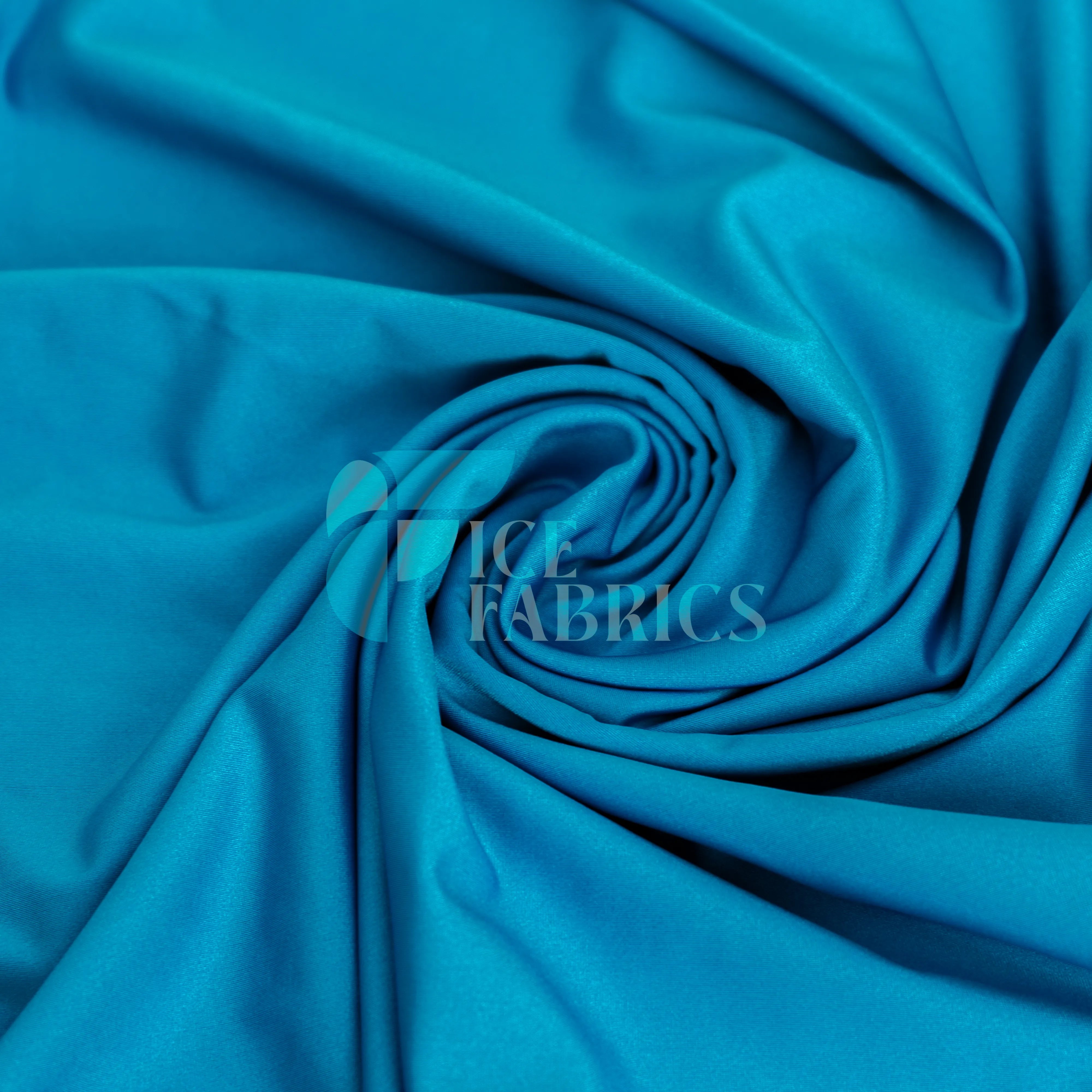 Jordan Turquoise Shiny Nylon Spandex Fabric / 4 Way stretch