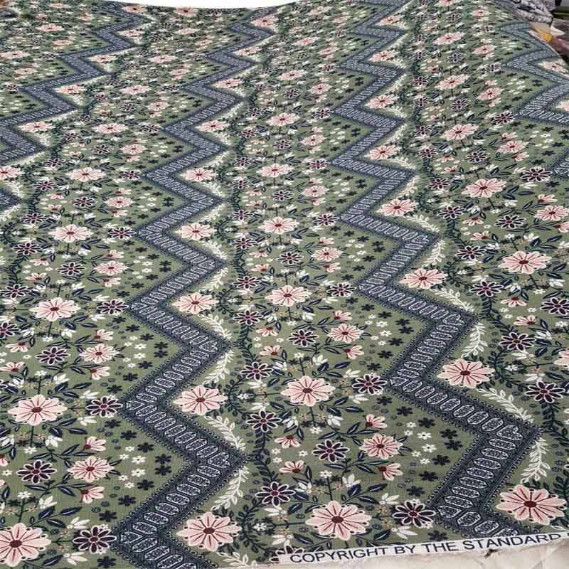 Corrugated Rayon Full Of Pink Flowers On A Light Olive Green Background Fabric 58" WideChallis FabricICEFABRICICE FABRICSCorrugated Rayon Full Of Pink Flowers On A Light Olive Green Background Fabric 58" Wide ICEFABRIC