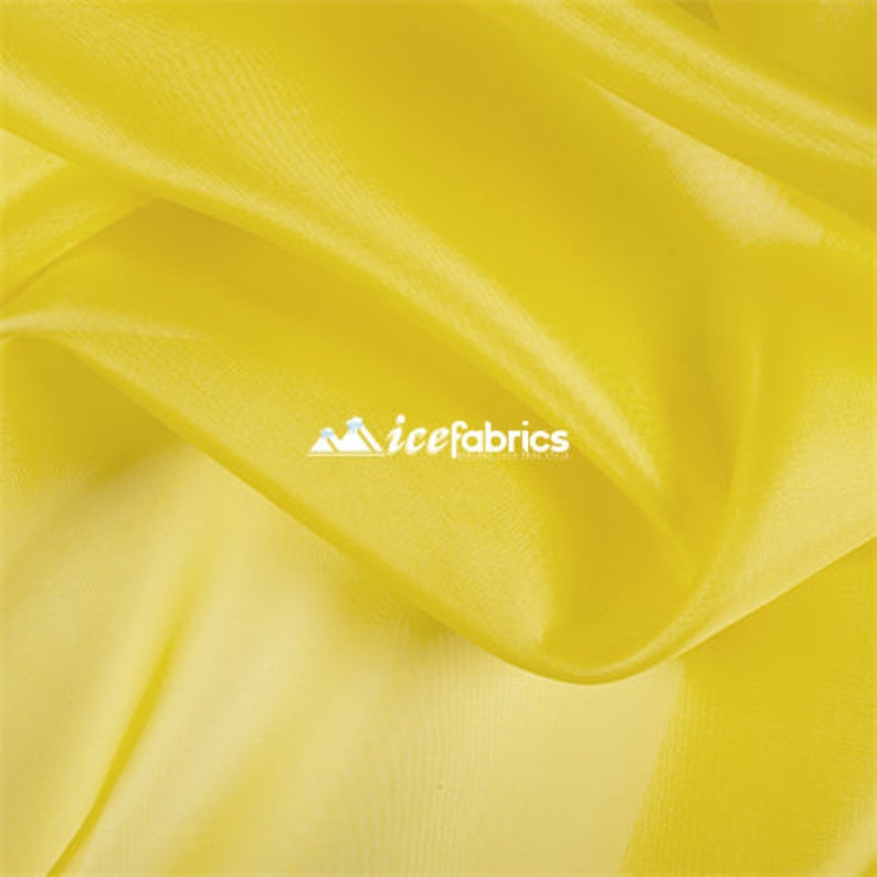 Crystal Sheer Organza Fabric By The Roll (100 Yards) 25 ColorsICEFABRICICE FABRICSYellowBy The Roll (60" Wide)Crystal Sheer Organza Fabric By The Roll (100 Yards) 25 Colors ICEFABRIC Yellow