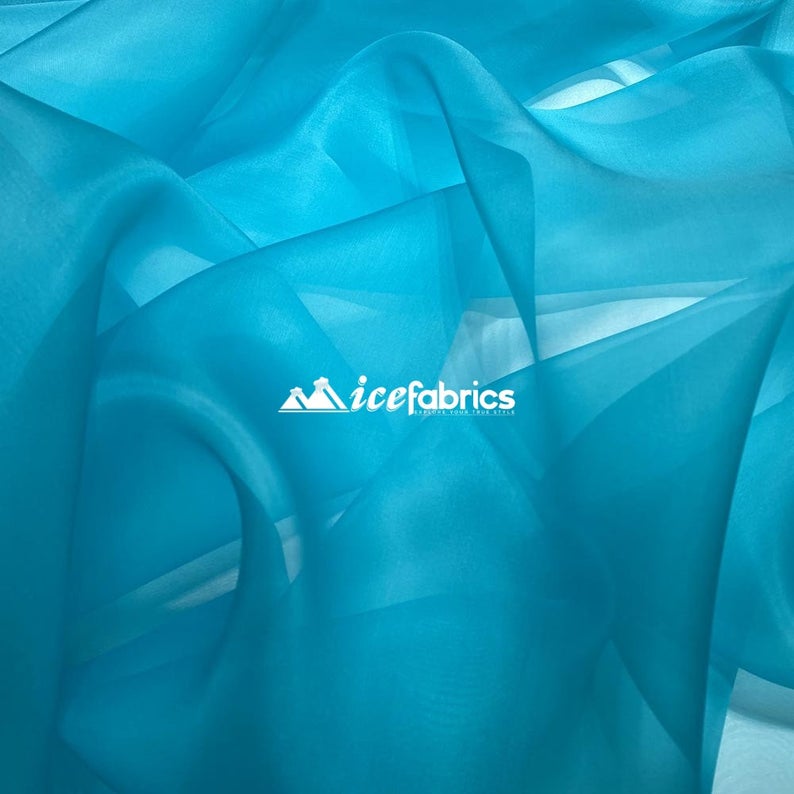 Crystal Sheer Organza Fabric By The Roll (100 Yards) 25 ColorsICEFABRICICE FABRICSTurquoiseBy The Roll (60" Wide)Crystal Sheer Organza Fabric By The Roll (100 Yards) 25 Colors ICEFABRIC Turquoise
