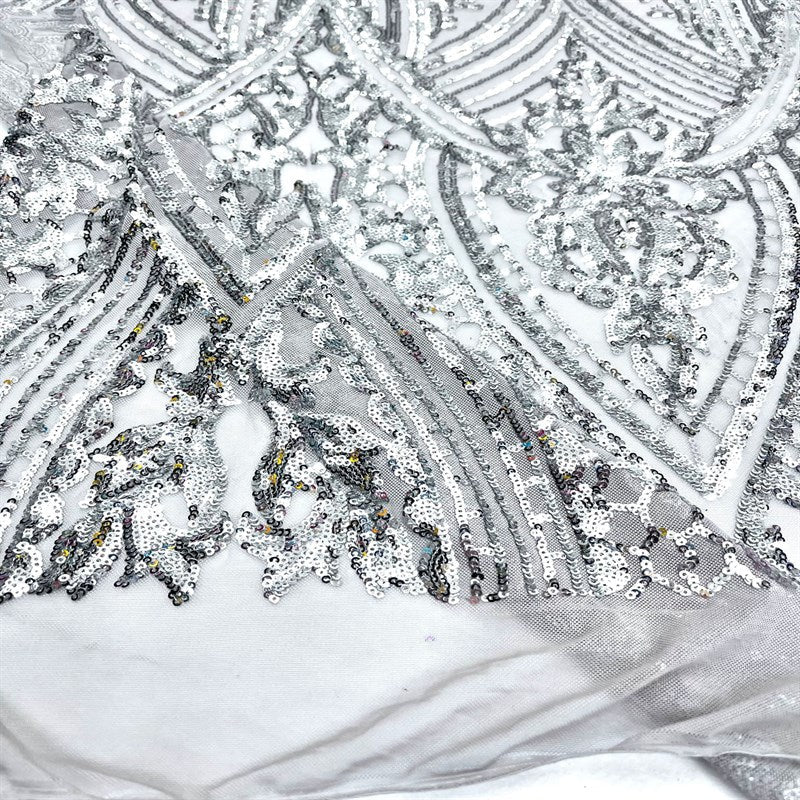 Elizabeth Embroidery Sequin Fabric Geometric Stretch MeshICE FABRICSICE FABRICSElizabeth Sequin SilverBy the yard (36 inches Length)58 inches WidthSilverElizabeth Embroidery Sequin Fabric Geometric Stretch Mesh ICE FABRICS Silver