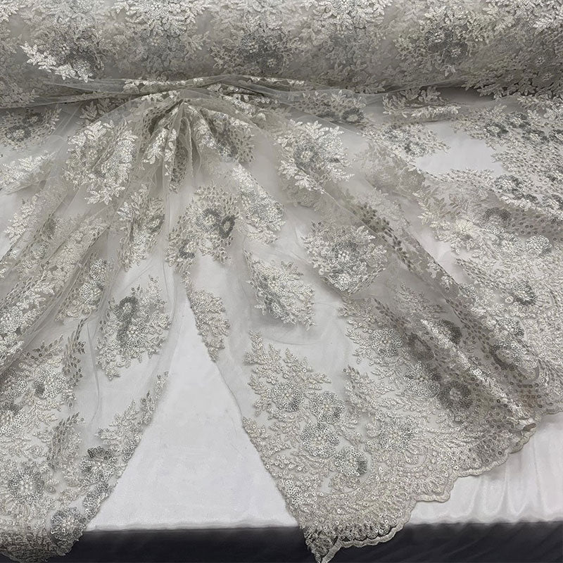 Embroidered Corded Metallic Flowers On Mesh Lace Fabric With SequinsICEFABRICICE FABRICSWhite/SilverEmbroidered Corded Metallic Flowers On Mesh Lace Fabric With Sequins ICEFABRIC White/Silver