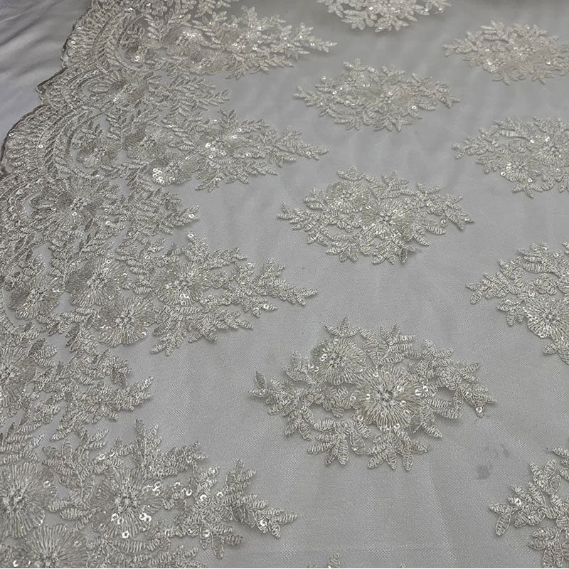 Embroidered Corded Metallic Flowers On Mesh Lace Fabric With SequinsICEFABRICICE FABRICSWhiteEmbroidered Corded Metallic Flowers On Mesh Lace Fabric With Sequins ICEFABRIC White
