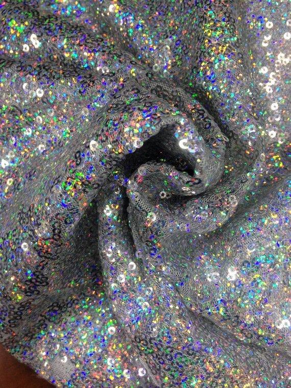 Fabulous Spangle/Glitz Sequin fabric 54 Inches Fabric Sold By The Yard Runners Dress Tablecloths DecorationsICE FABRICSICE FABRICSSparkly Silver MulticolorFabulous Spangle/Glitz Sequin fabric 54 Inches Fabric Sold By The Yard Runners Dress Tablecloths Decorations ICE FABRICS Sparkly Silver Multicolor