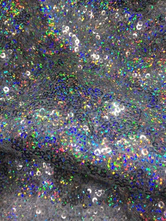 Fabulous Spangle/Glitz Sequin fabric 54 Inches Fabric Sold By The Yard Runners Dress Tablecloths DecorationsICE FABRICSICE FABRICSSparkly Silver MulticolorFabulous Spangle/Glitz Sequin fabric 54 Inches Fabric Sold By The Yard Runners Dress Tablecloths Decorations ICE FABRICS Sparkly Silver Multicolor