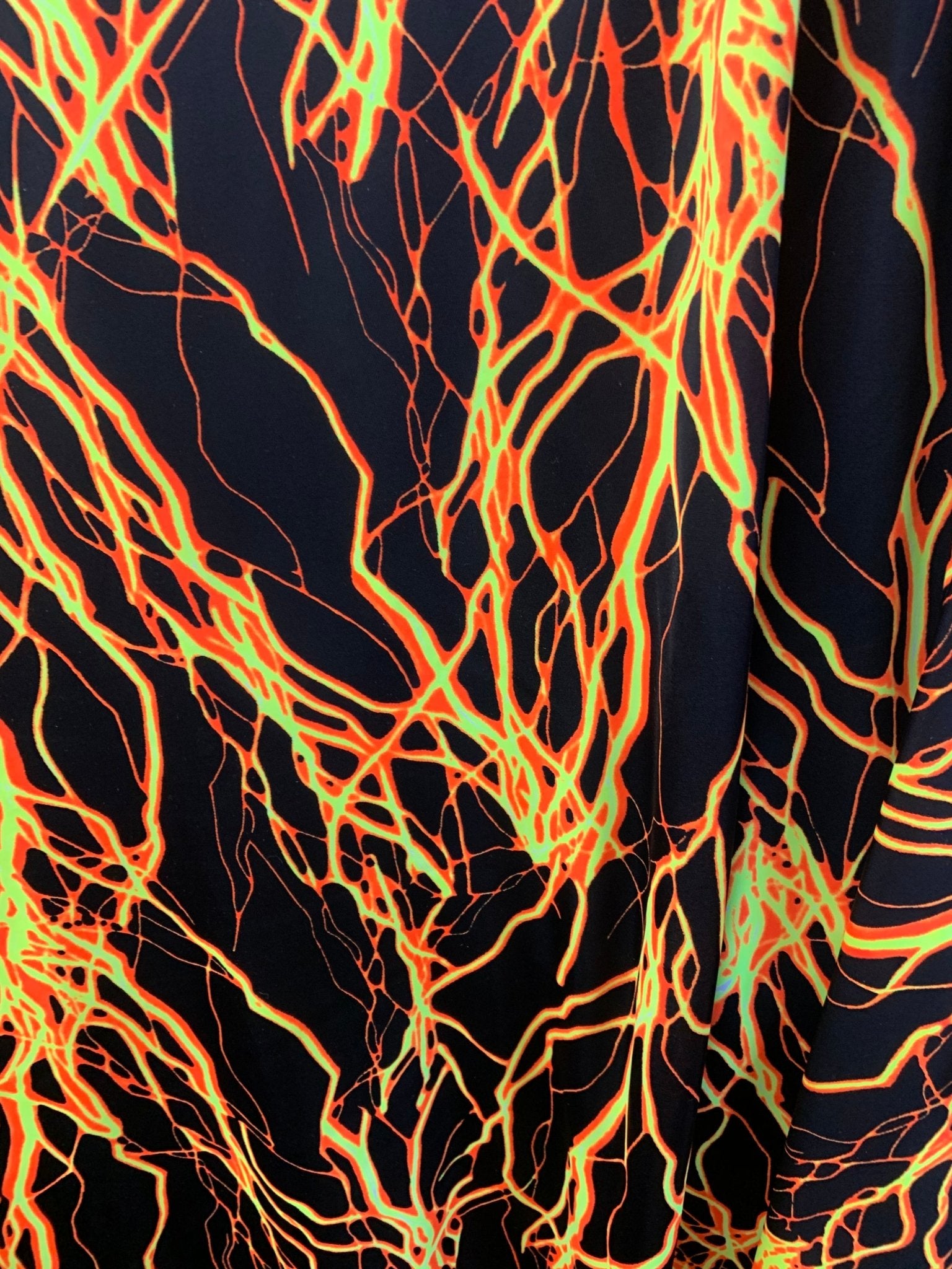 Lighting Bolt Orange/Black Nylon Spandex Fabric By The YardSpandex FabricICEFABRICICE FABRICSLighting Bolt Orange/Black Nylon Spandex Fabric By The Yard ICEFABRIC