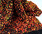 Iridescent Orange on Black Stretch Velvet Sequin Upholstery Fabric All Over Full Sequin