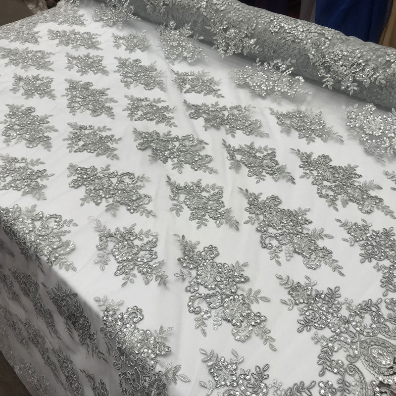 Modern Flower Design Metallic Embroidered Cord Prom With Sequins Mesh Lace FabricICE FABRICSICE FABRICSSilverModern Flower Design Metallic Embroidered Cord Prom With Sequins Mesh Lace Fabric ICE FABRICS