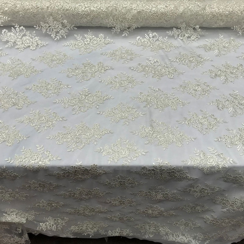 Modern Flower Design Metallic Embroidered Cord Prom With Sequins Mesh Lace FabricICE FABRICSICE FABRICSOff WhiteModern Flower Design Metallic Embroidered Cord Prom With Sequins Mesh Lace Fabric ICE FABRICS