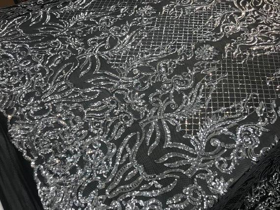 New Design 4 Way Stretch Sequins On A Mesh Lace Fabric For Decorations Fashion Wedding Prom DressesICE FABRICSICE FABRICSBlack/SilverNew Design 4 Way Stretch Sequins On A Mesh Lace Fabric For Decorations Fashion Wedding Prom Dresses ICE FABRICS