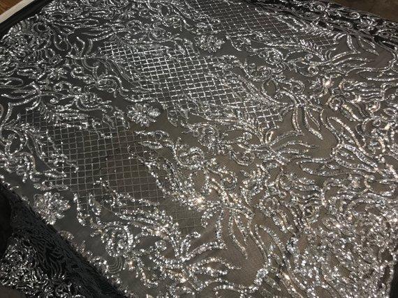 New Design 4 Way Stretch Sequins On A Mesh Lace Fabric For Decorations Fashion Wedding Prom DressesICE FABRICSICE FABRICSBlack/SilverNew Design 4 Way Stretch Sequins On A Mesh Lace Fabric For Decorations Fashion Wedding Prom Dresses ICE FABRICS