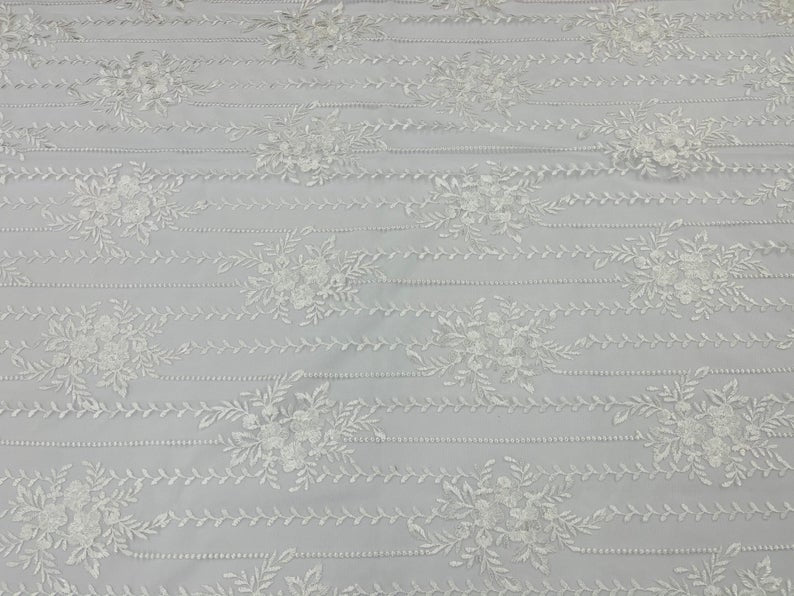 Of White Lace Fabric _ Embroidered Floral Flowers Lace on Mesh FabricICE FABRICSICE FABRICSBy YardOf White Lace Fabric _ Embroidered Floral Flowers Lace on Mesh Fabric ICE FABRICS