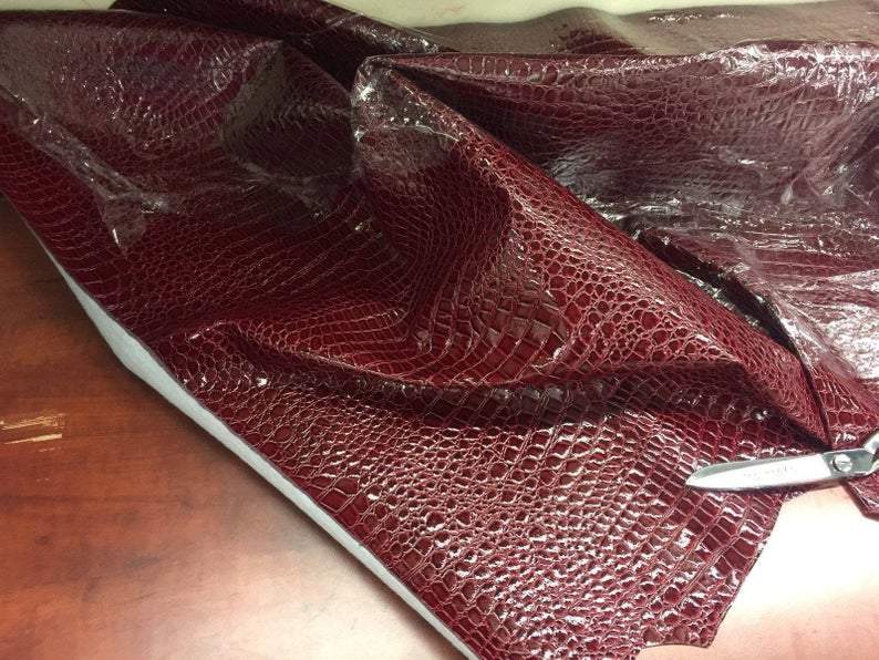 Shiny Crocodile Embossed Faux Leather Vinyl Fabric Upholstery By The Yard For Frames, Pillows, Headboards, Purses, ShoeICEFABRICICE FABRICSBurgundyShiny Crocodile Embossed Faux Leather Vinyl Fabric Upholstery By The Yard For Frames, Pillows, Headboards, Purses, Shoe ICEFABRIC