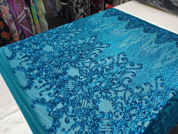 Turquoise Luxury Design Embroidered 4 Way Stretch Sequin Fabric Sold By The YardICE FABRICSICE FABRICSTurquoise Luxury Design Embroidered 4 Way Stretch Sequin Fabric Sold By The Yard ICE FABRICS